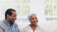 Elderly couple talking to the nurse